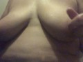 Massaging in strawberry oil on my big soft tits so they smell so good that I have to taste them