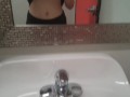 Playing with my big tits at work in the loo