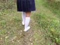 Schoolgirl in white knee socks walk nature foot feet fetish under skirt