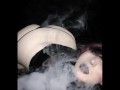 Curvy goth vaping in sheer outfit