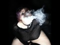 Curvy goth vaping in sheer outfit