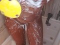 Sexy Ebony babe takes a shower caressing small tits and ass