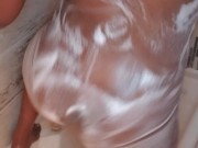 Sexy Ebony babe takes a shower caressing small tits and ass