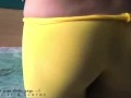 A bitch in yellow pantyhose touches her pussy, teases, taking off her stockings. 2