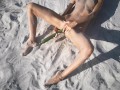 Amateur nudist teen fucks her tight pussy with a huge cucumber on a public beach. Ends with a pee.