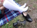 Foot fetish girl show shoes and feet in white knee socks