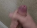 Uncut teen jacks off and cums on shower wall