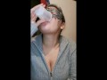 Girl Drinking and Burping