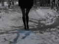 Public winter walk backlit in the ass