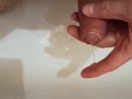 Pissing, spiting on the dickhead and jerk off in the bathroom.
