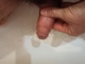 Pissing, spiting on the dickhead and jerk off in the bathroom.