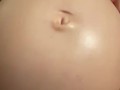 Cumming on her huge pregnant belly