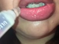 Mommy applies lipgloss to DSL