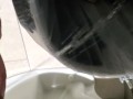 Shakily Pissing in the Garbage