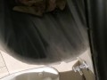 Shakily Pissing in the Garbage