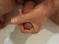 Pissing on my palm and masturbating my dick in the bathroom.