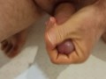 Pissing on my palm and masturbating my dick in the bathroom.