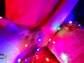 Snow Maiden brings herself to orgasm in Christmas lights