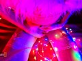 Snow Maiden brings herself to orgasm in Christmas lights