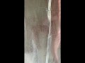 iPhone catches horny tattooed step-mom masturbating in the shower in hot portrait video