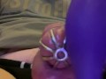 Caged sissy cumming with a vibrator 
