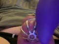Caged sissy cumming with a vibrator 