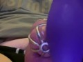 Caged sissy cumming with a vibrator 