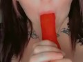 Egirl sucks on big pink dildo