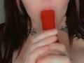 Egirl sucks on big pink dildo