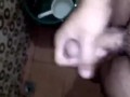 Horny Young Guy Having Fun Jerking Off His Huge Cock in the Toilet