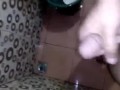 Horny Young Guy Having Fun Jerking Off His Huge Cock in the Toilet