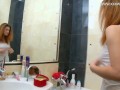 Redhead Ksenia Valasatik gets orgasms in the shower