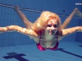 Elena Proklova spreading legs underwater