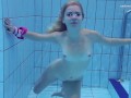 Elena Proklova spreading legs underwater