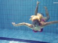 Elena Proklova spreading legs underwater