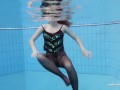 Zuzanna swims naked and horny in the pool