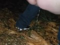 Peeing in the woods along the side of the road