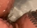 Mullato ebony rubs pussy in tub