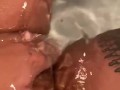 Mullato ebony rubs pussy in tub