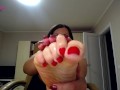 Red polished toes self sucking