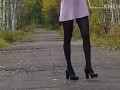 Walking in the park without panties in a mini dress and showing pussy