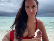 Juicy blowjob from a busty brunette on a desert island