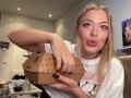 bitch with big tits eats a hamburger nicely