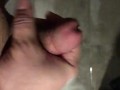 Stocky guy wanking his thick cut cock in the shower with big cumsot