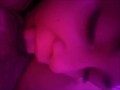 eating babe under the soft pink light