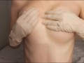 OILED TITS MASSAGED IN MEDICAL LATEX GLOVES SMALL TITS FETISH NIPPLES CLOSE UP