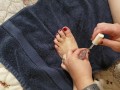 Pretty Little Toes Getting Painted.