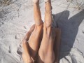 Tight Pussy takes a Hot Golden Shower while being Penetrated by a Cucumber on the Beach