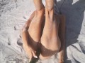Tight Pussy takes a Hot Golden Shower while being Penetrated by a Cucumber on the Beach