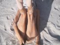 Tight Pussy takes a Hot Golden Shower while being Penetrated by a Cucumber on the Beach
